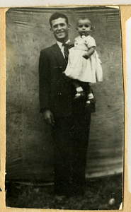 Manuel Santos holding niece, Maria