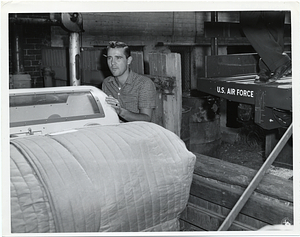 Unidentified man with two iron lungs