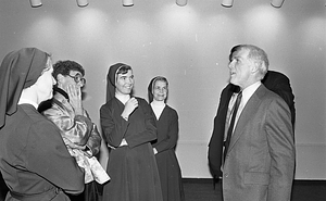 Mayor Kevin H. White with unknown individuals the Strand Theatre