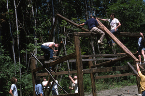 Installing rafters in Moon Barn Raising at entrance to Hopkins Forest on 2 August 1975.