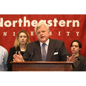 U.S. Senator Edward Kennedy (D-MA) speaks at the podium surrounded by students during a press conference on student aid