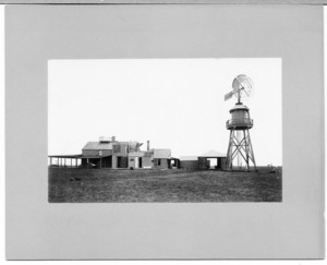 Exterior view of Dr. Bigelow's home with windmill, Tuckernuck Island, Mass., undated