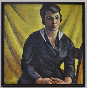 Portrait of a woman, in yellow