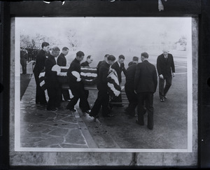 Attendants carrying Will Rogers' casket