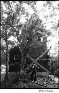 James Taylor's house: Taylor standing in front of his under construction house