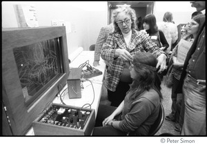 Demonstration of biofeedback machine (?) at the Kohoutek Celebration of Consciousness