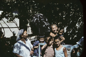 Woman and group of children