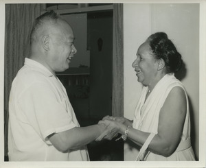 Shirley Graham Du Bois holding hands with Chen Yi