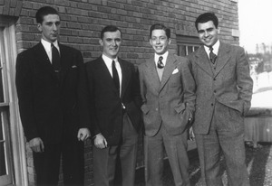 Porter Whitney, John Foley, Roger Biron and Leon Barron standing outside