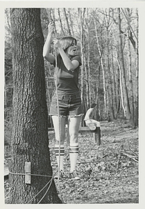 A Student Hanging onto a Rope at Freshman Camp