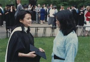 Graduate Holding her Cap.