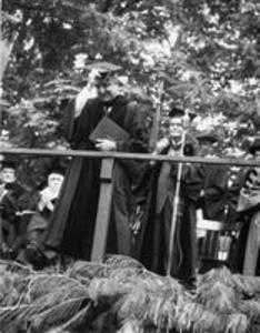Faculty member bowing during Commencement, 1959