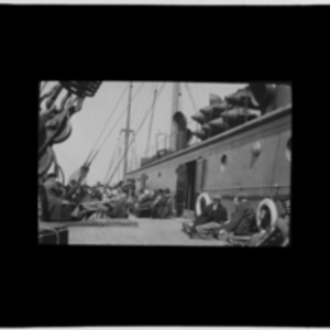 Passengers rest on the deck