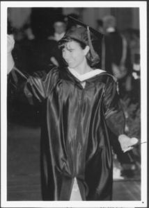 Suffolk University student receives her degree at commencement, circa 1990s