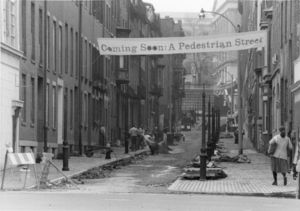 View of Temple Street and Suffolk University banner that reads: "Coming soon: a pedestrian street"