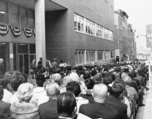 View of attendees at the inauguration of Suffolk University President Thomas A. Fulham (1970-1980) on Temple Street
