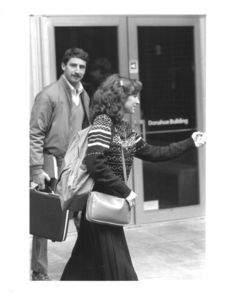Two students outside of Suffolk University's Donahue Building (41 Temple Street)