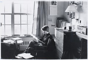 Student reading in dorm room at Boston College