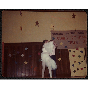 A girl and a boy dancing together at the Boys and Girls Club's 2nd Annual Talent Show