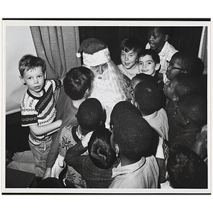 A group of boys visits with Santa Claus
