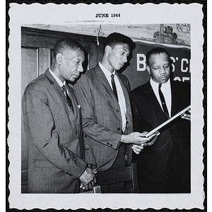 "Boy of the Year, Oswald Gooden with father and Otis Cash"