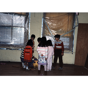 Guests and a piñata during the Chinese Progressive Association's children's party