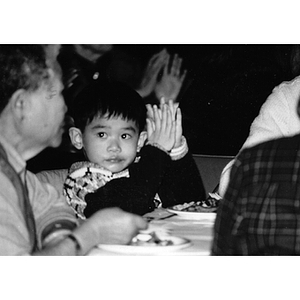 Guests attend a celebration held at the Josiah Quincy School marking Chinatown's victory to build a community center on Parcel C