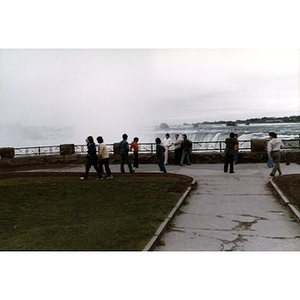 Chinese Progressive Association members stand on the observation deck at Niagara Falls