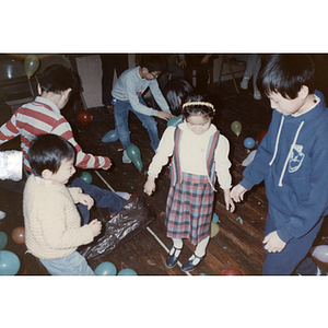 Children playing at Chinese Progressive Association anniversary event