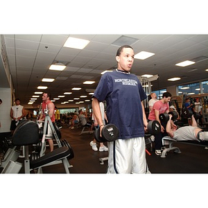 Odalis David Polanco lifts weights at the Marino Center gym