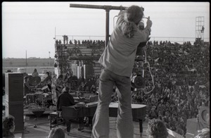 Hollywood Speedway Rock Festival: roadie adjusting lighting on stage