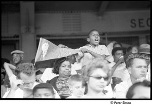 Mets at Shea Stadium: boy with his mother holding a banner