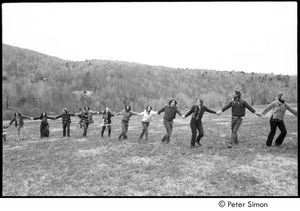 May Day at Packer Corners commune: group holding hands, Elliot Blinder sixth from left