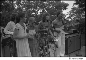 My Wedding: Kate Taylor, Ellen Epstein, Carly Simon, and John Hall, from left to right, performing with unidentified bass player