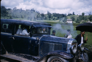 Vintage car overheating near the Baghmati river