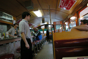 View of a waiter and counter at the Miss Florence Diner