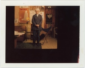 Frances Crowe: full-length portrait, standing, in her living room
