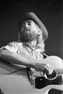 New Riders of the Purple Sage opening for the Grateful Dead at Sargent Gym, Boston University: John 'Marmaduke' Dawson playing acoustic guitar