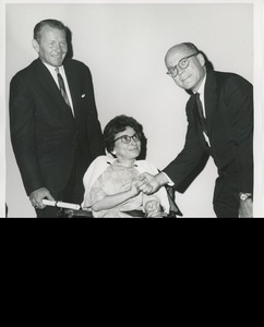 HEW secretary Robert H. Finch, Miss Charlotte Cohen, and Jeremiah Milbank, Jr.