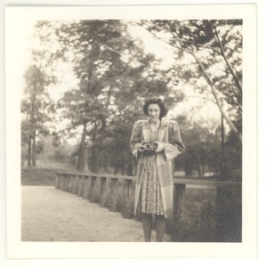 Judy G. Wood Langland: portrait with camera