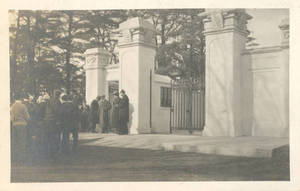 Group of people standing outside the Pratt Field entrance during the opening ceremony (1910)