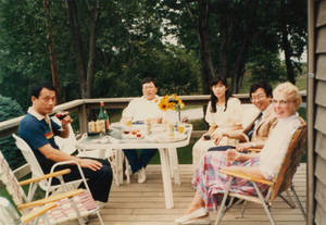 Professor Mizutani siting at a table eating.