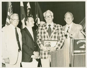 Charles E. Silvia being inducted into the International Swimming Hall of Fame, 1976