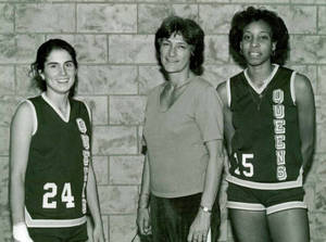 Lucille Kyvallos with two basketball players