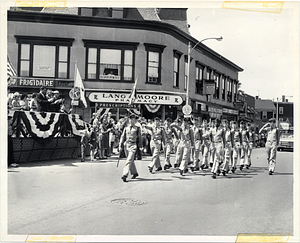 Military personnel in a parade on Bowdoin and Hamilton Streets