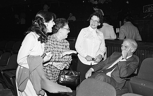 Mayor Kevin H. White with three unidentified women at the Strand Theatre