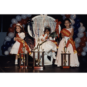 Three young girls wearing crowns at the Festival Puertorriqueño
