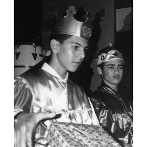 Two of the Three Kings distributing gifts during a community holiday celebration at the Jorge Hernandez Cultural Center.