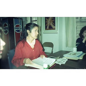 Executive Clara Garcia at a meeting.