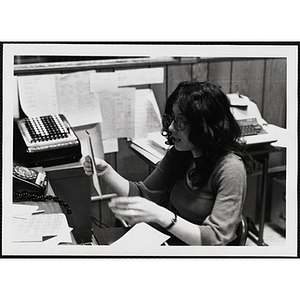 A female staff member working in an office